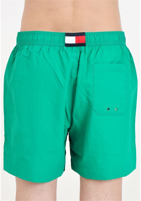 Shorts mare verde da uomo con piccolo logo TOMMY HILFIGER | UM0UM03280L4B